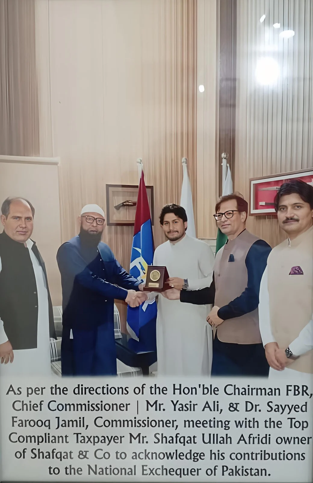 Client-supplied Federal Board of Revenue taxpayer recognition photograph